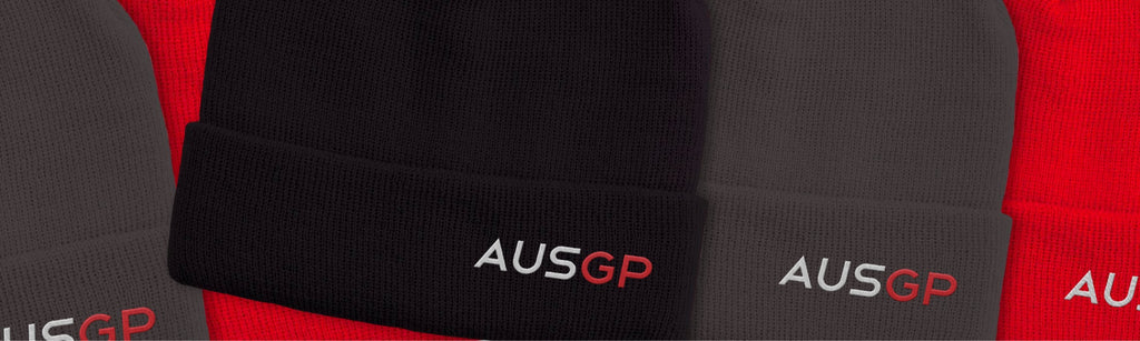 a wide image of AUSGP branded beanies